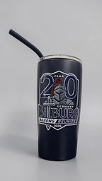 A dark navy blue insulated tumbler with a black straw, featuring a commemorative graphic for the '2026 Barons Reunion' in Bilburg, Germany. The tumbler is photographed on a neutral light gray background.