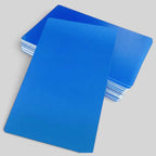 A stack of solid blue metal rectangular cards with rounded corners, with one card in the foreground and another partially visible behind it, set against a plain light gray background.
