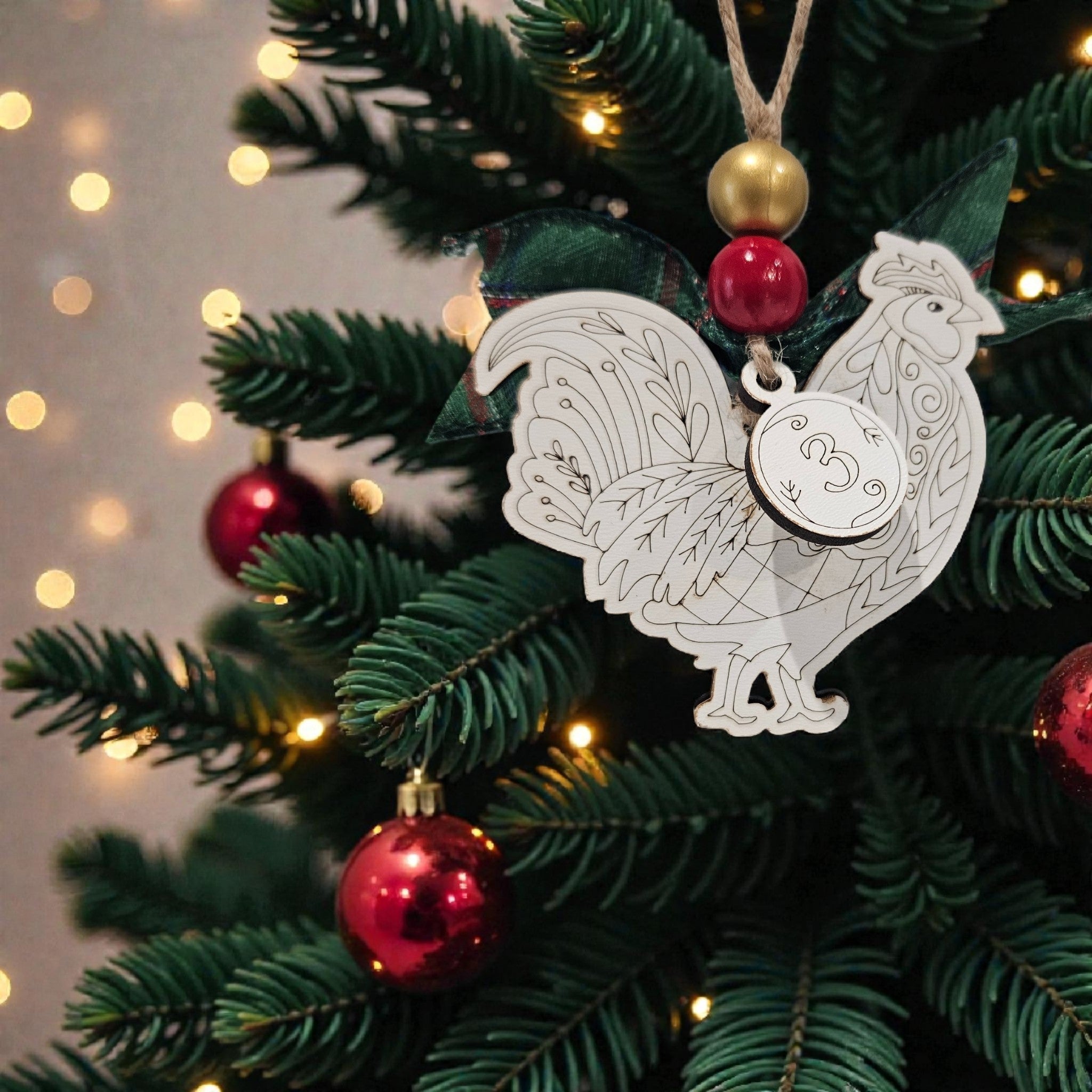 Day 3: “Day 3 three French hens engraved white wood ornament hanging on Christmas tree with bow and bead.
