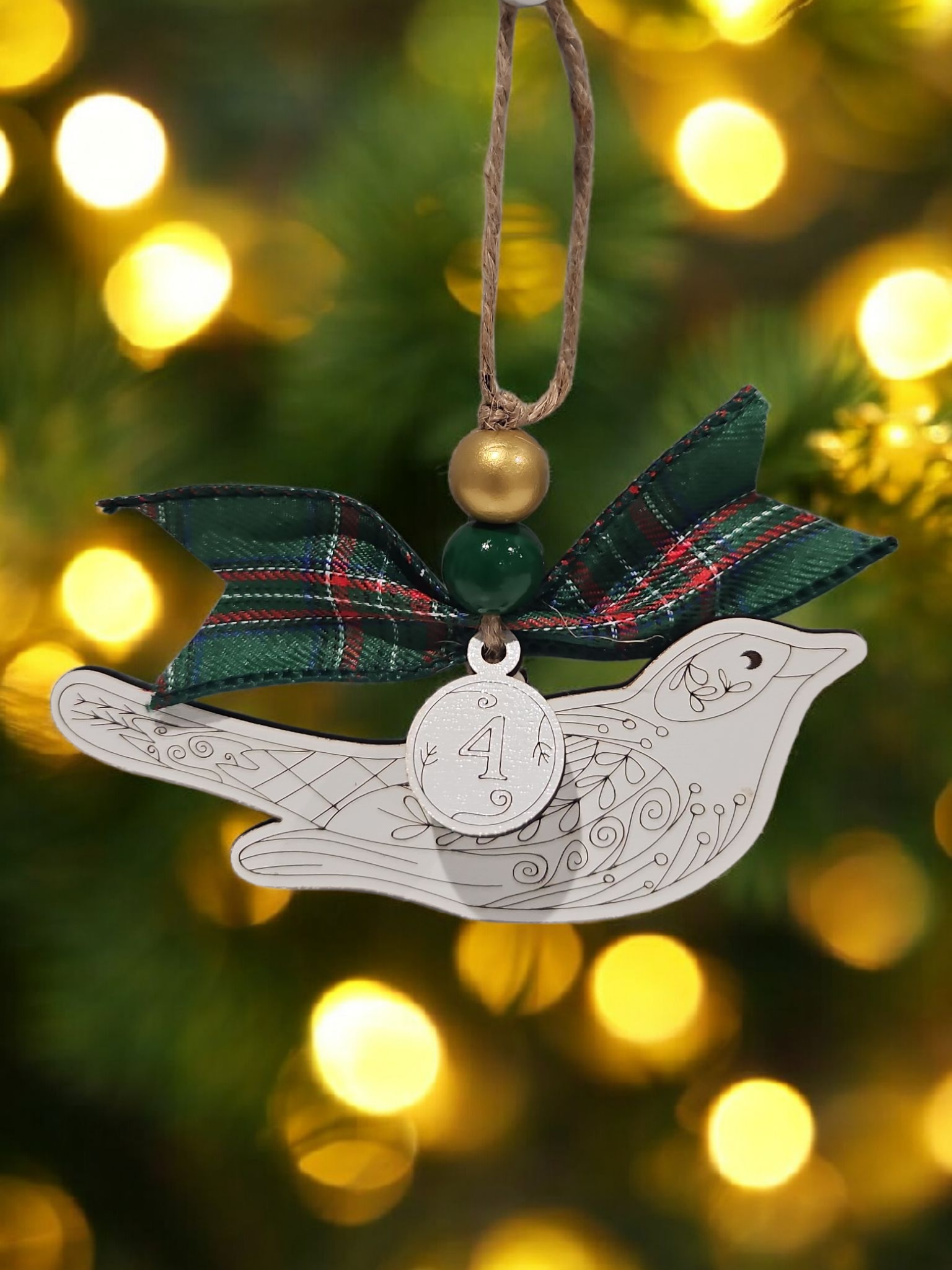 Day 4 four calling birds engraved white wood Christmas ornament hanging on Christmas tree with bow and bead