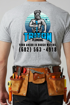 A person shown from the back wearing a heather gray T-shirt with a large back graphic for Triton Plumbing, plus a brown leather tool belt with tools, against a plain light gray background.