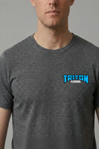 A man wearing a dark heather gray crewneck t-shirt with a blue and white 'TRITON PLUMBING' logo on the left chest, set against a plain gray background.